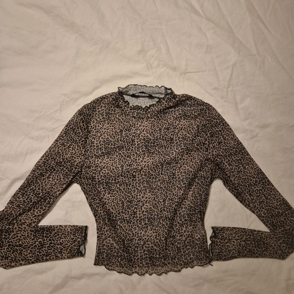 Leopardmönstrad mesh polotopp från SHEIN