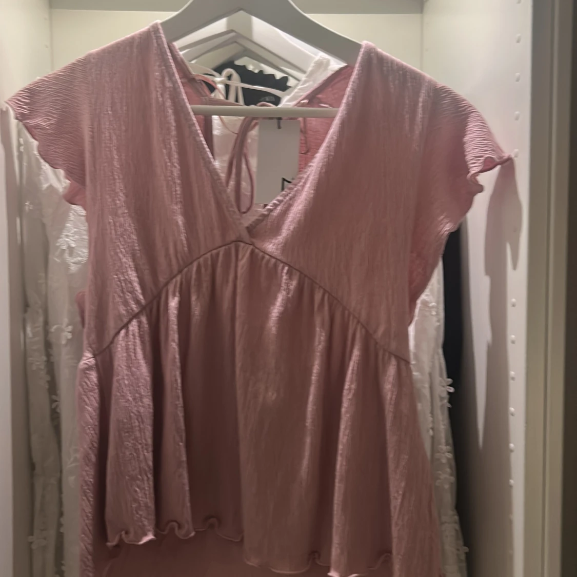 Rosa omlottklänning från 157