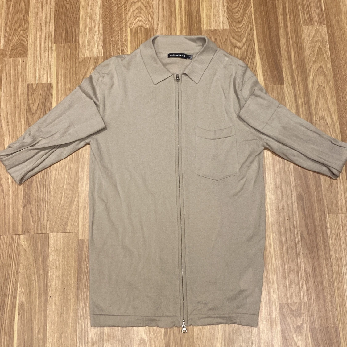 Beige tröja med dragkedja från J.Lindeberg