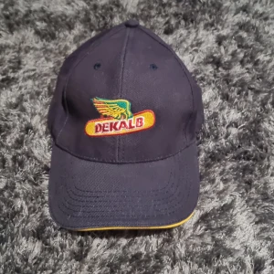 Keps - Aldrig använd fin Keps dekalb