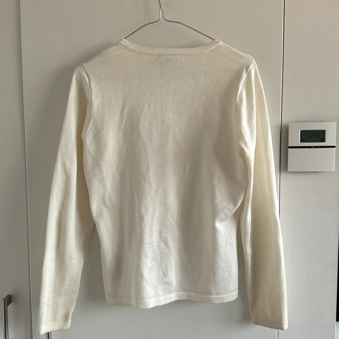 Glittrig vit kofta  - 90