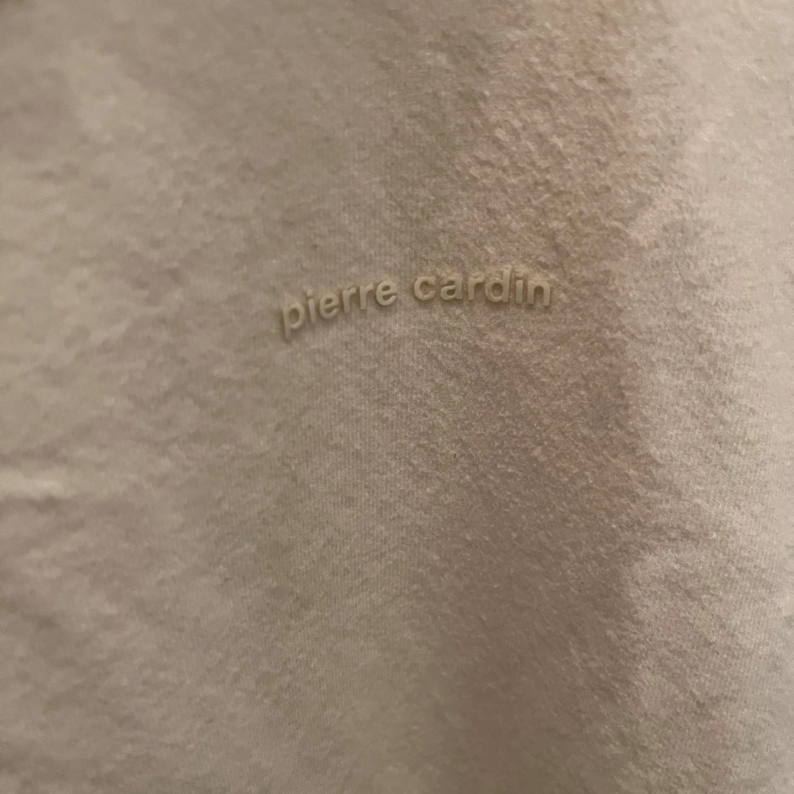 Beige pikétröja från Pierre Cardin - 90