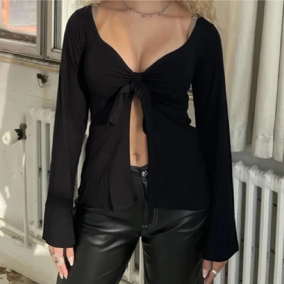Svart långärmad topp från Design by Si