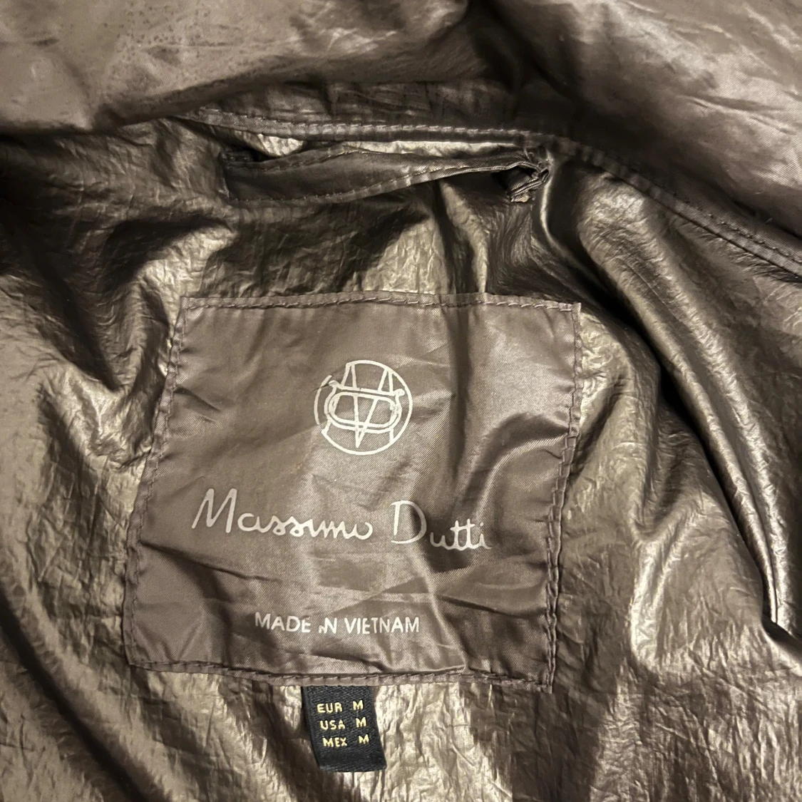 Khaki färgad pufferjacka från Massimo Dutti - 91