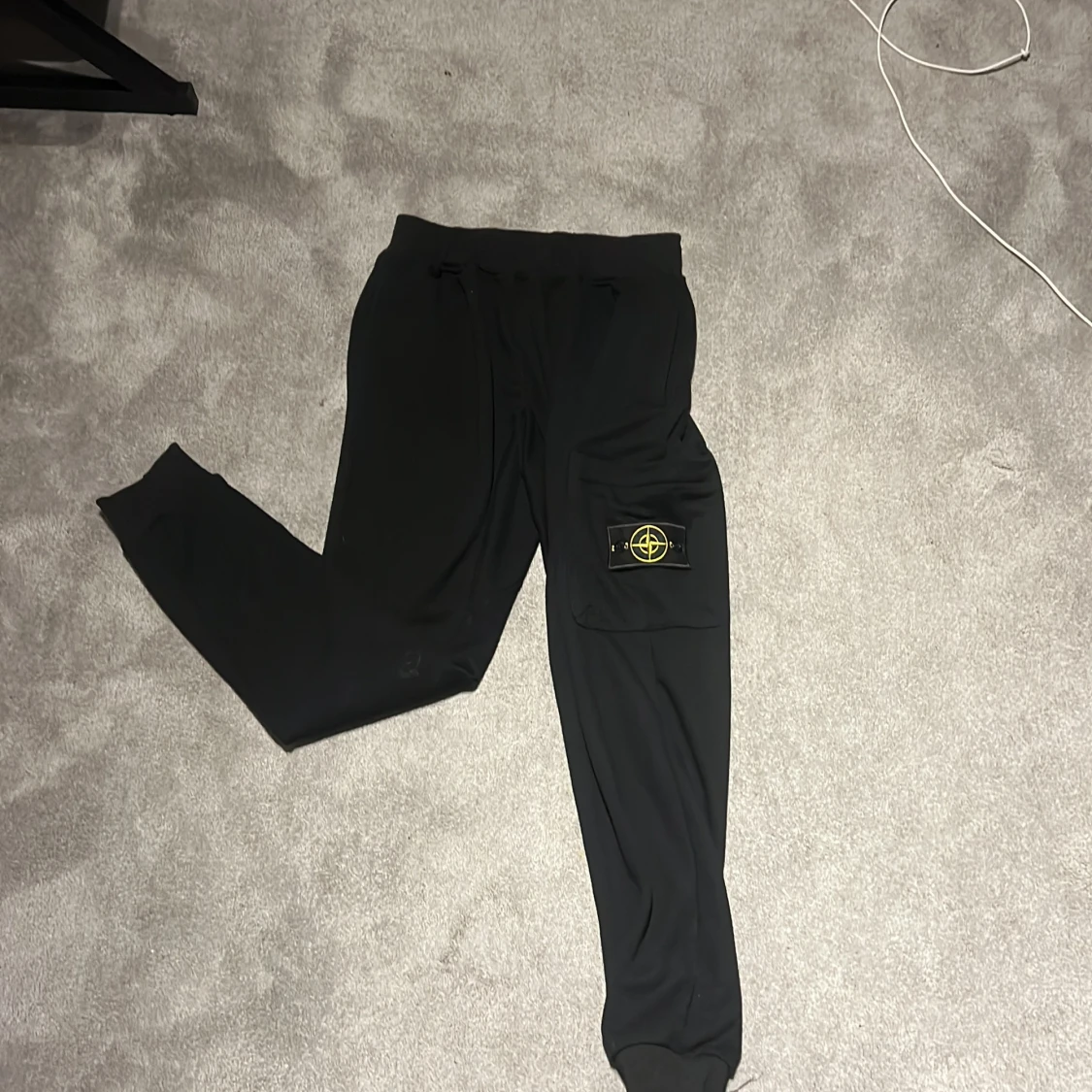 Svarta byxor från Stone Island