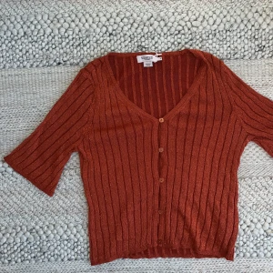 Orange glittrig kofta - Orange glittrig kofta som jag säljer för 100