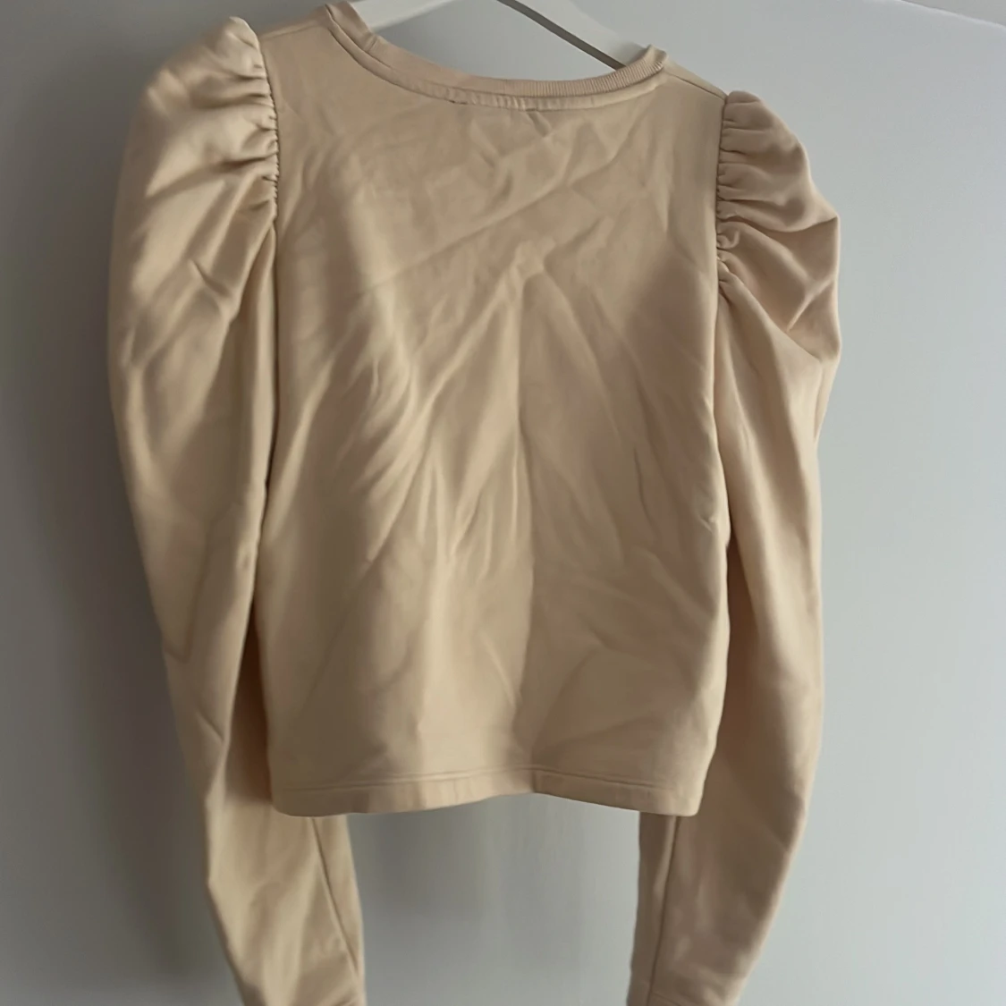 Beige tjocktröja