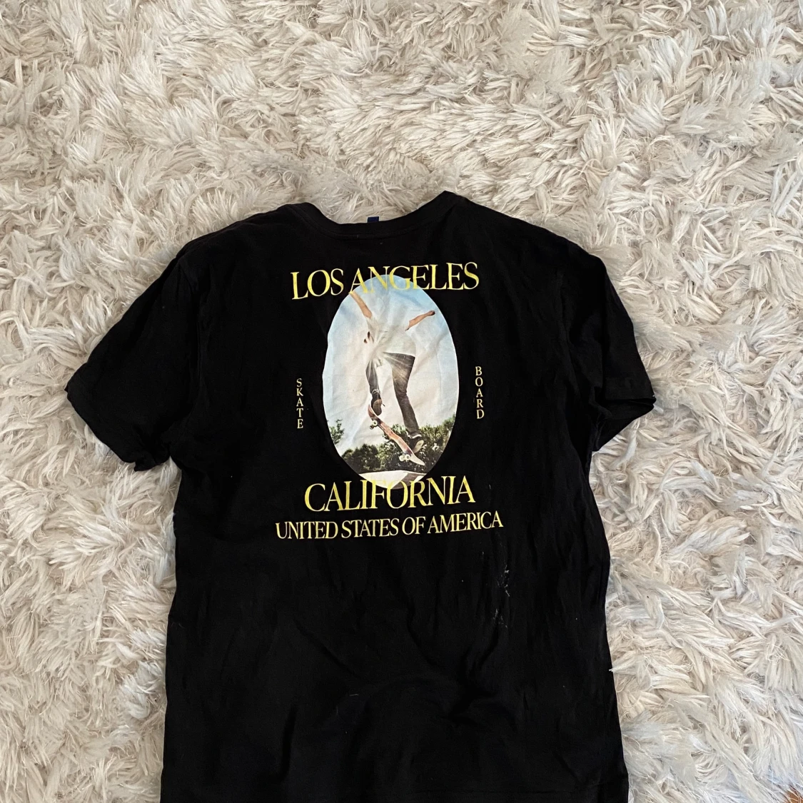 Svart t-shirt med Los Angeles-tryck - 90