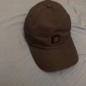  Hugo boss keps - Säljer min keps från Hugo då den inte kommer till användning. Pris går sjävklart att diskuteras!