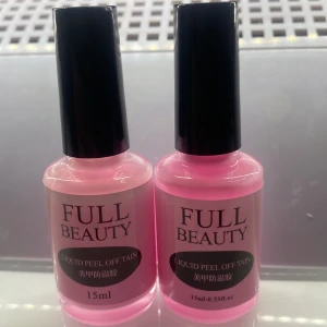 Full Beauty Liquid Peel Off Tain - Två flaskor med rosa flytande peel off-produkt från Full Beauty jag har redan två av dessa råka köpa två till. Varje flaska innehåller 15 ml och är perfekt för att skydda nagelbanden vid nagellackering. Enkel att applicera och ta bort. Helt nya oanvända säljs för 59st