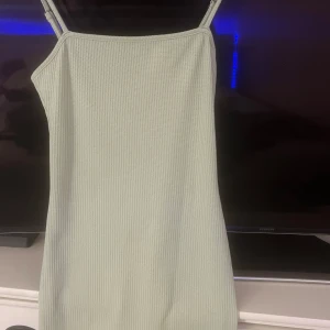 Klänning - En väldigt ljusgrön taight klänning