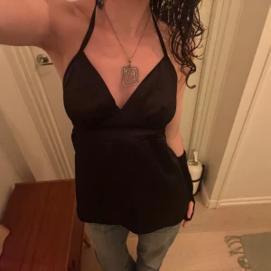 Svart halternecktopp - Jättefin topp i storlek s men passar även xs