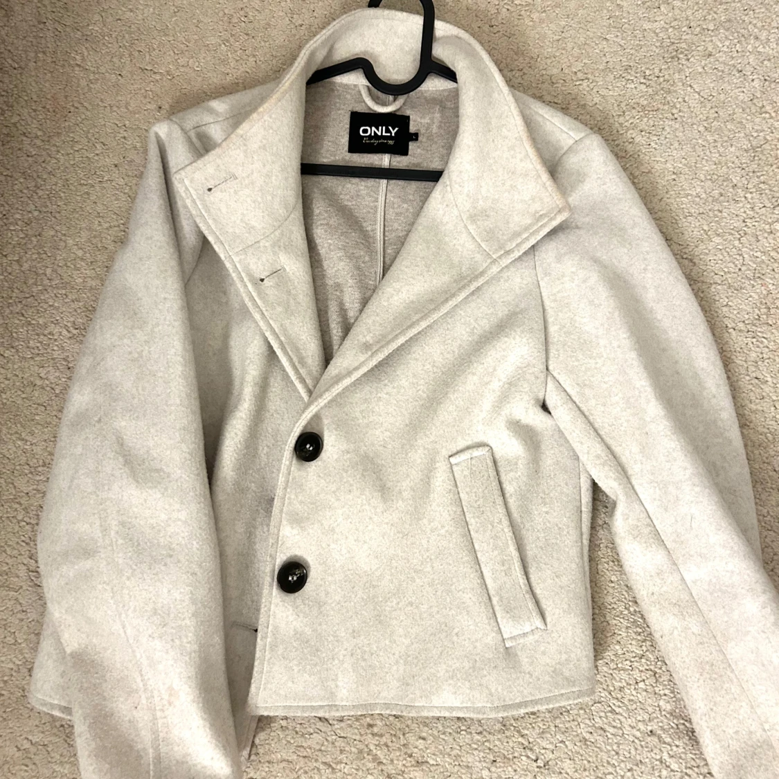 Ljus beige/grå kappa