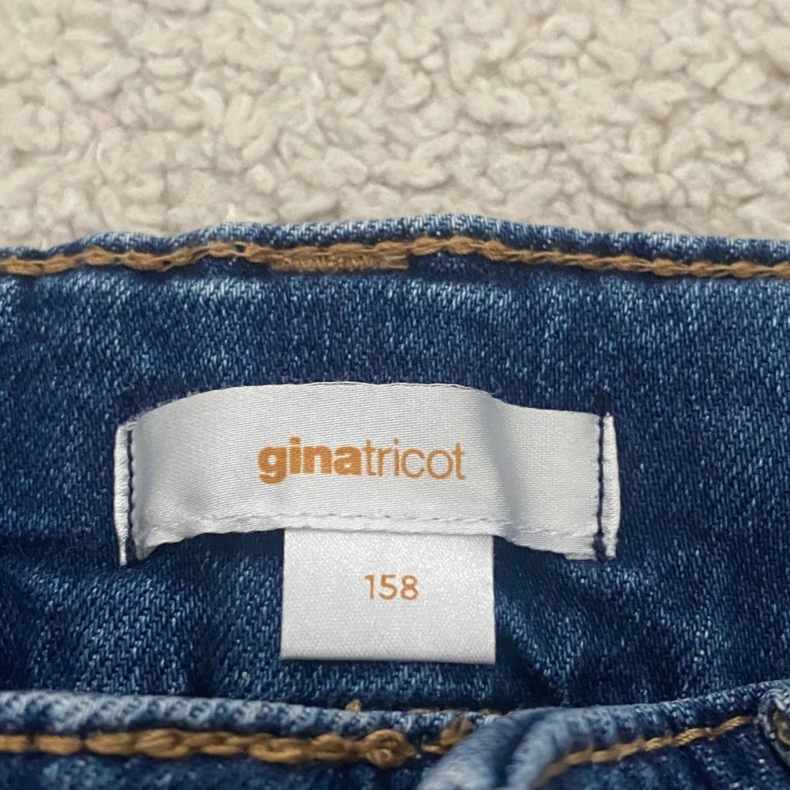 Blå lågmidjade bootcut jeans från Gina Tricot - 2