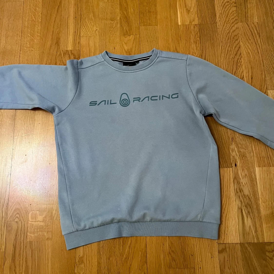 Blå tröja från Sail Racing