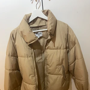 Vinterjacka  - En vinterjacka jag fick den jacka i present men den var liten för mig