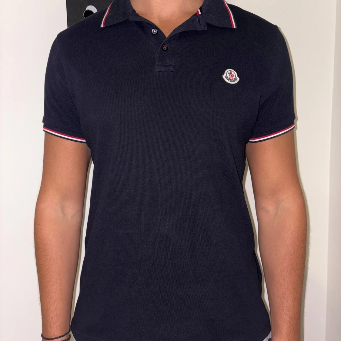 Svart pikétröja från Moncler