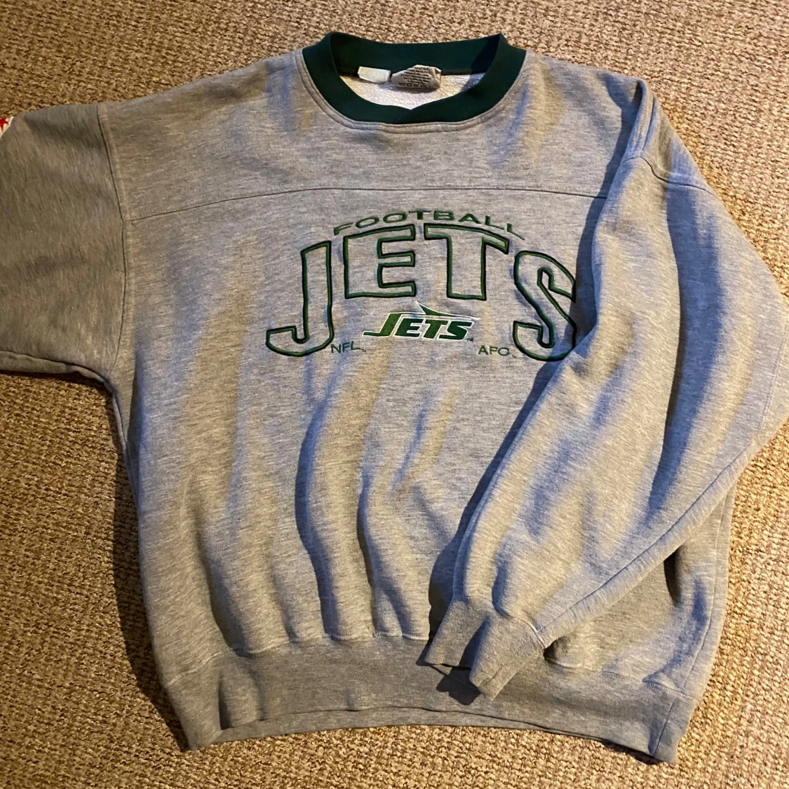 Grå sweatshirt med Jets-tryck