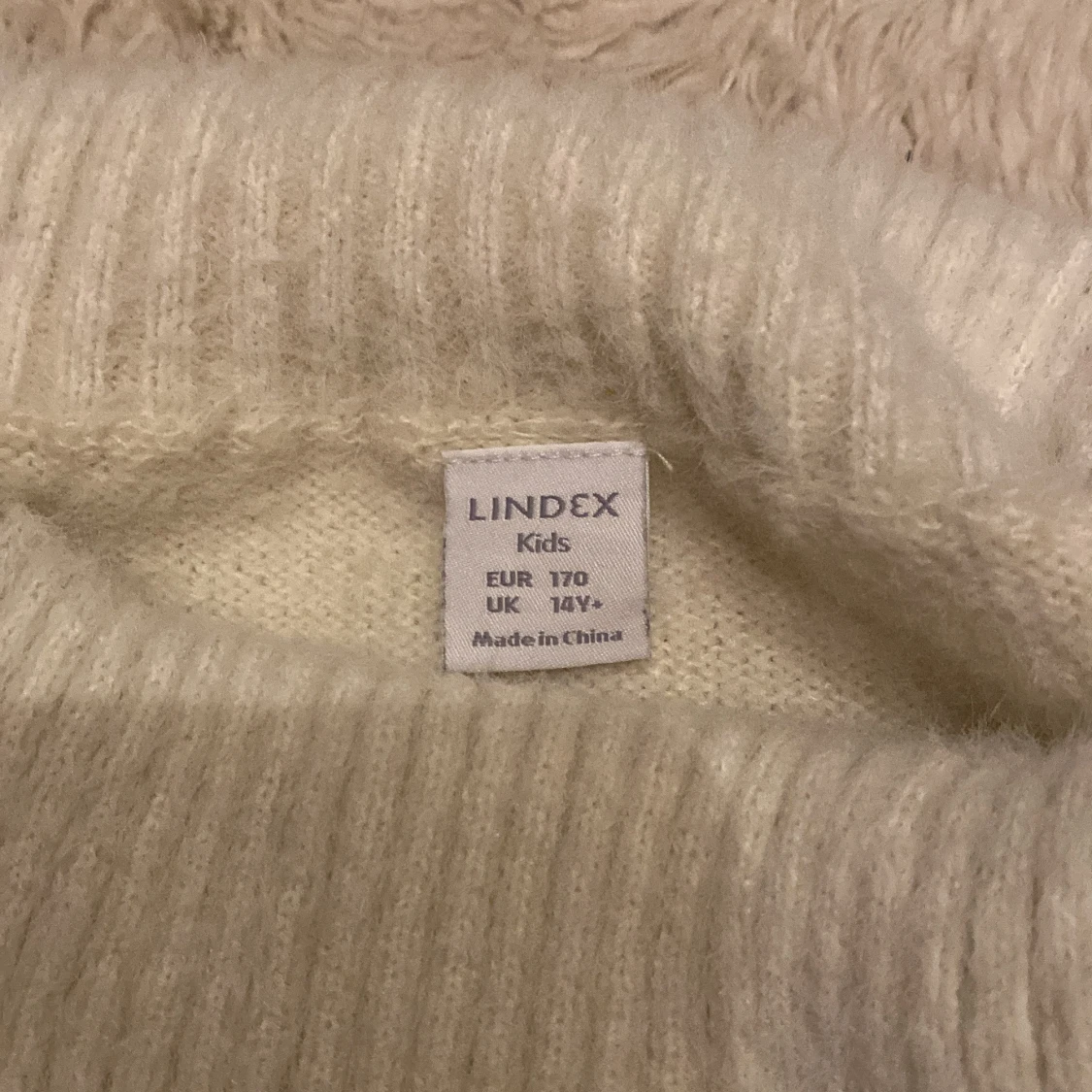 Beige/vit stickad polotröja från Lindex - 90