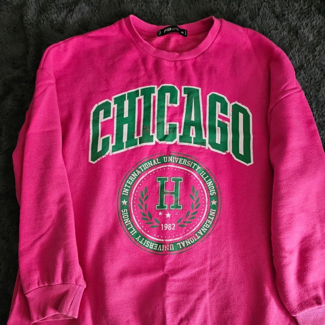 Rosa sweatshirt med Chicago-tryck