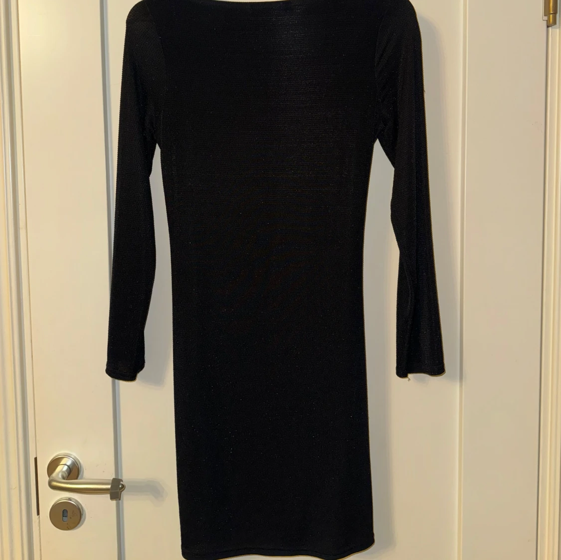 Glittrig klänning - 91