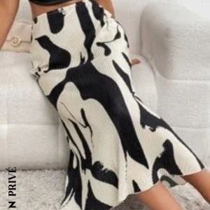 Svart/vit kjol - Svart/vit kjol i strl S