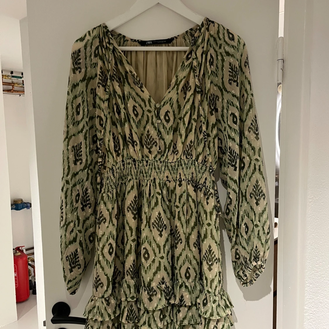 Grön mönstrad klänning