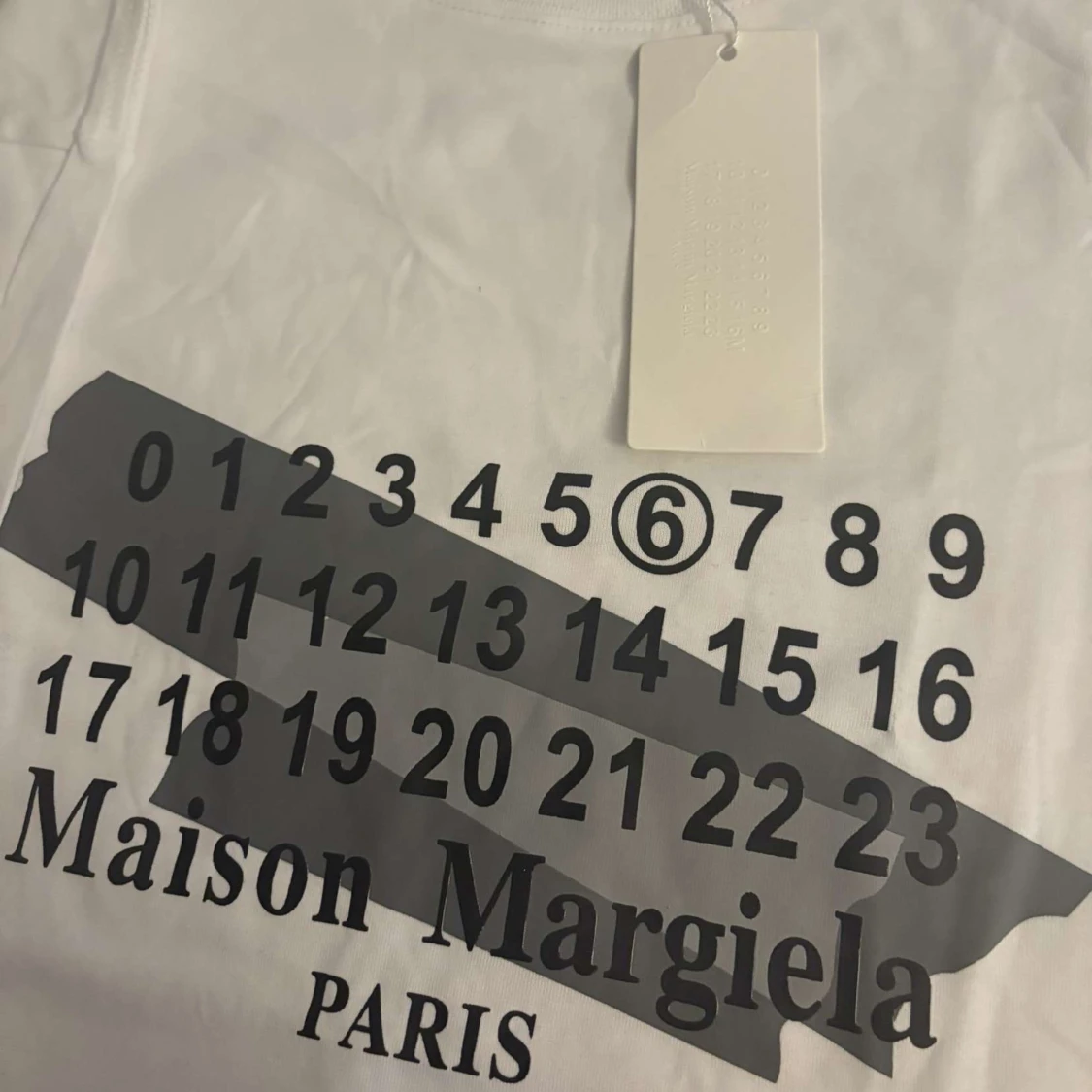 Vit t-shirt från Maison Margiela - 90