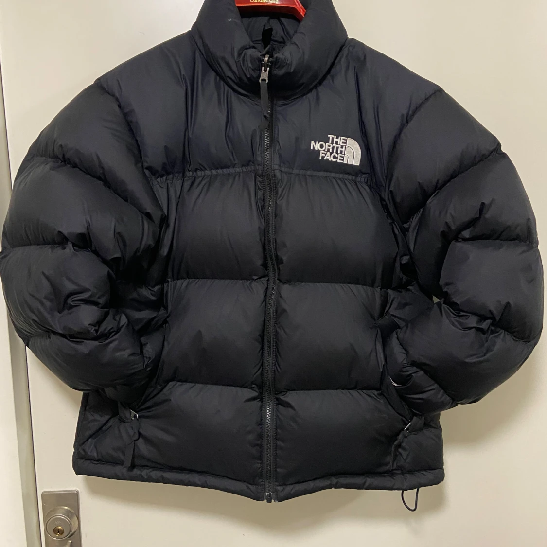 Svart dunjacka från The North Face - 90