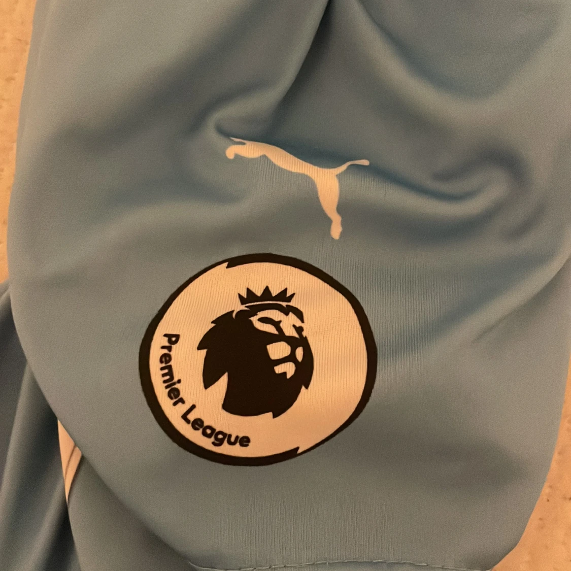 Ljusblå fotbollströja från Puma - 92