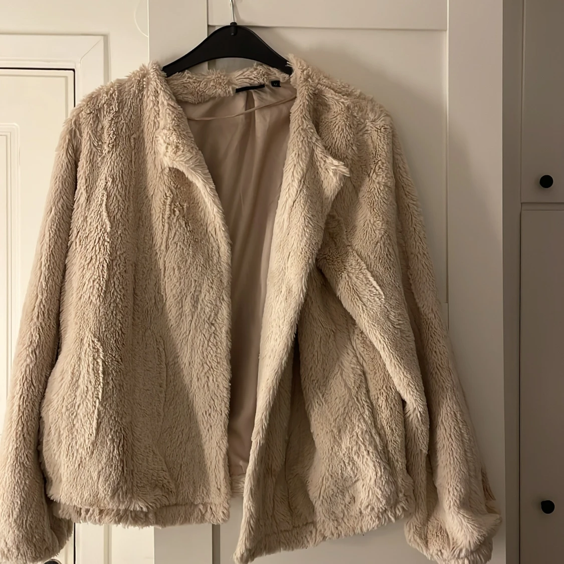 Beige teddyjacka