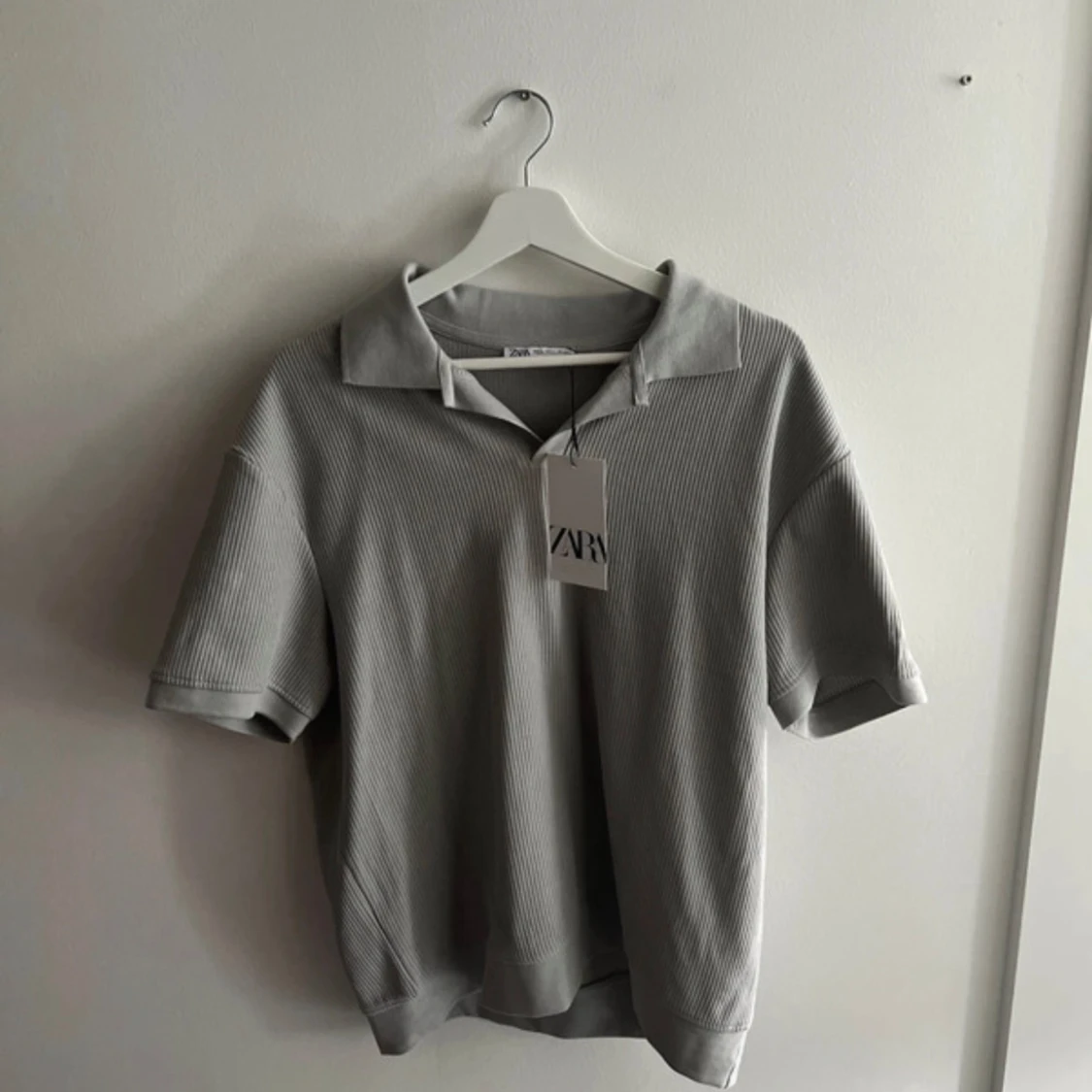 Grå pikétröja från Zara