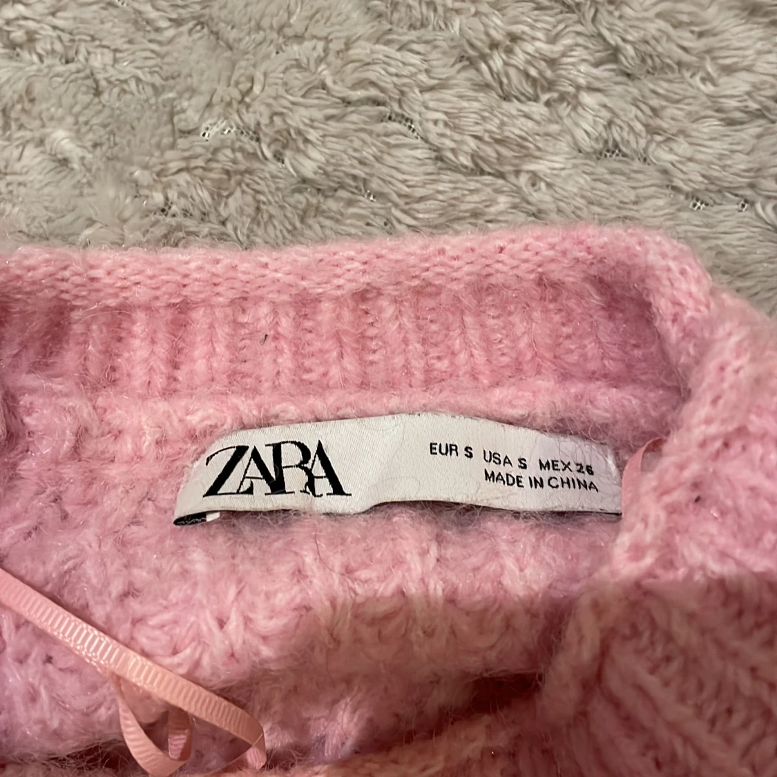 Rosa stickad tröja - 1