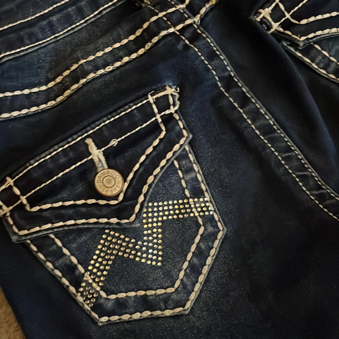 Mörkblå lowaist bootcut jeans från Bamboo - 92