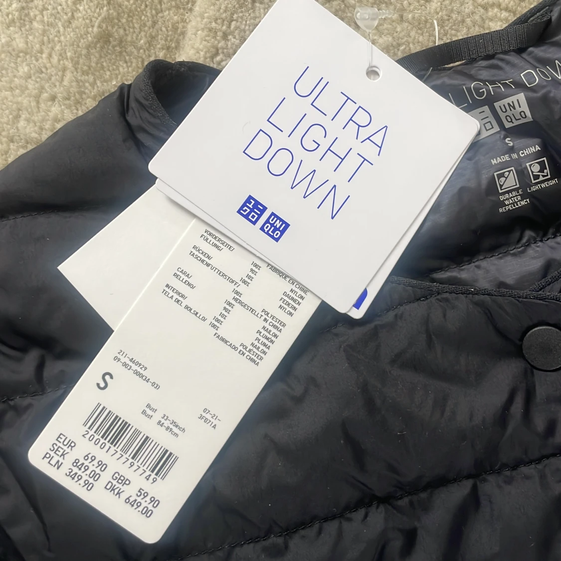 Svart dunjacka från Uniqlo - 2