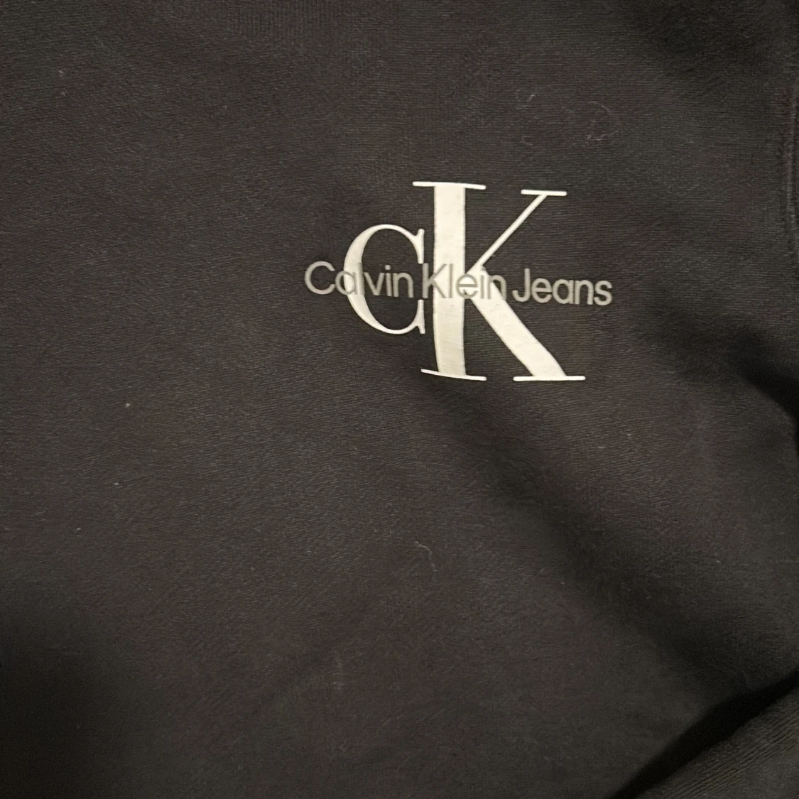 Svart hoodie från Calvin Klein Jeans - 90