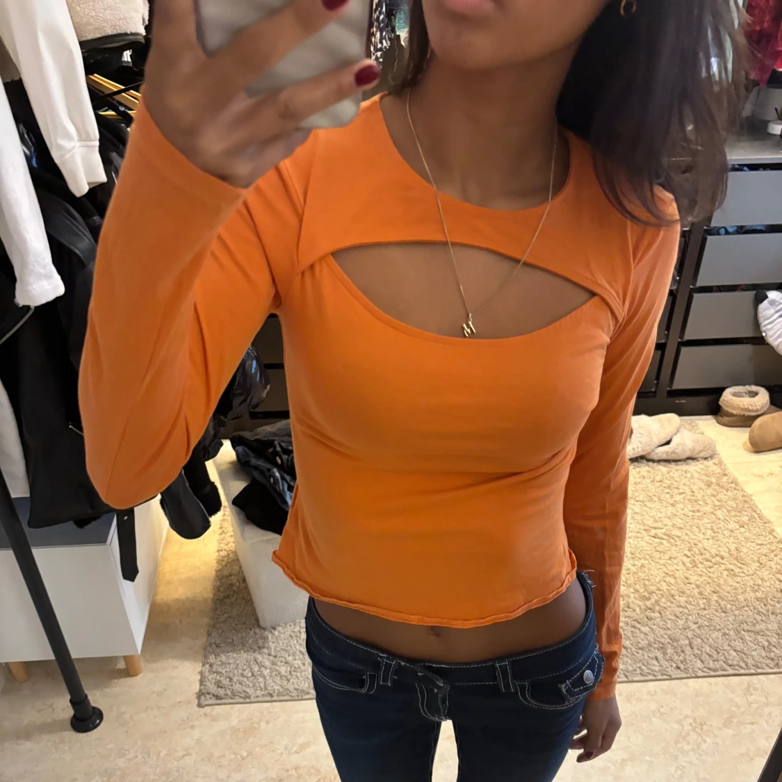 Orange långärmad topp med cut-out