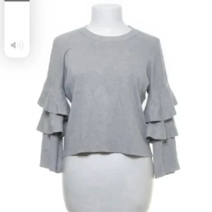 Grå tröja med volangärmar - Säljer denna skit snygga tröja