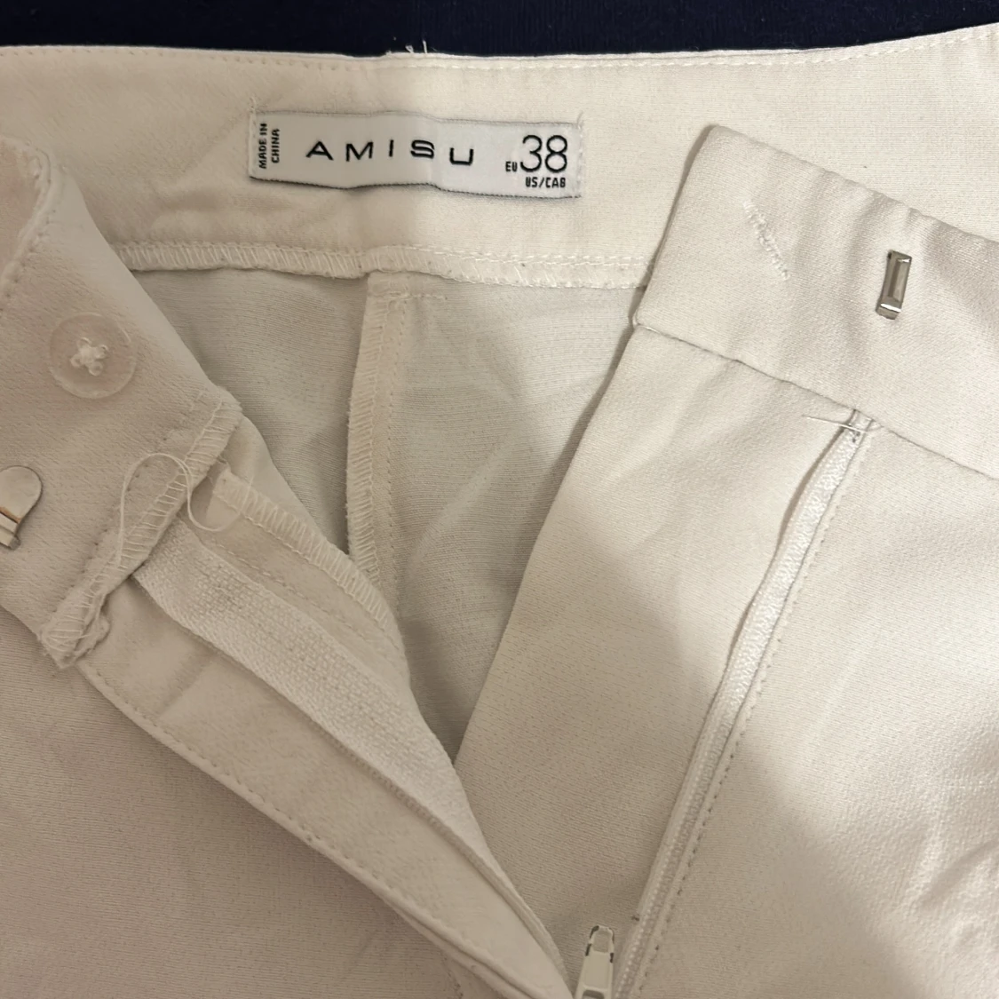 Vita bootcut kostymbyxor - 91