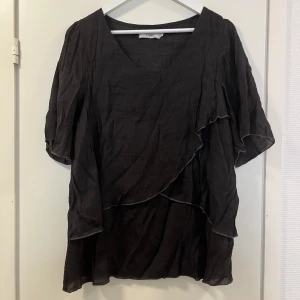 Zizzi pusero  - Zizzin musta pusero 