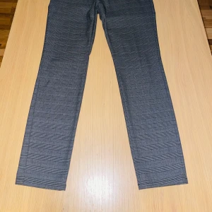 HUGO Trousers - Slim fit trousers in a soft cotton and elastane fabric blend.   Rarely used/worn due to size.  Trouser series: HUGO Heldor194 Collection: Spring, 2020. 