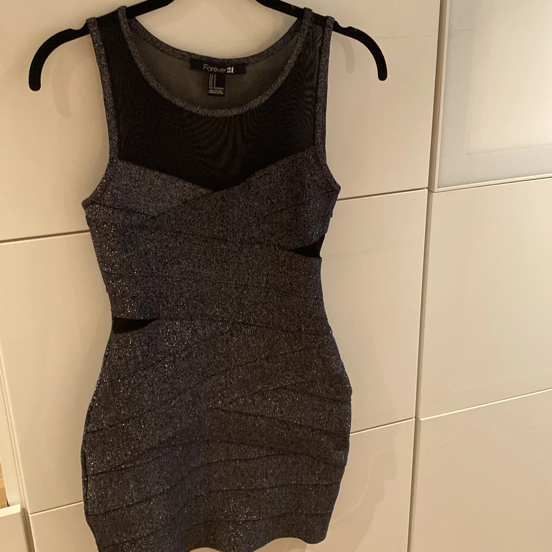 Glittrig klänning - 90