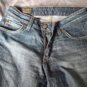 LEE Sommar Jeans - LEE Cameron W27L33. Hög midja bredd. Stright  Använt få gånger 