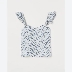 Linne - Säljer så himla sött linne med volang! Nyskick 