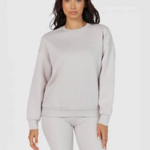 Sweatshirt  - Beige sweatshirt från Lounge. Nyskick. Storlek L.