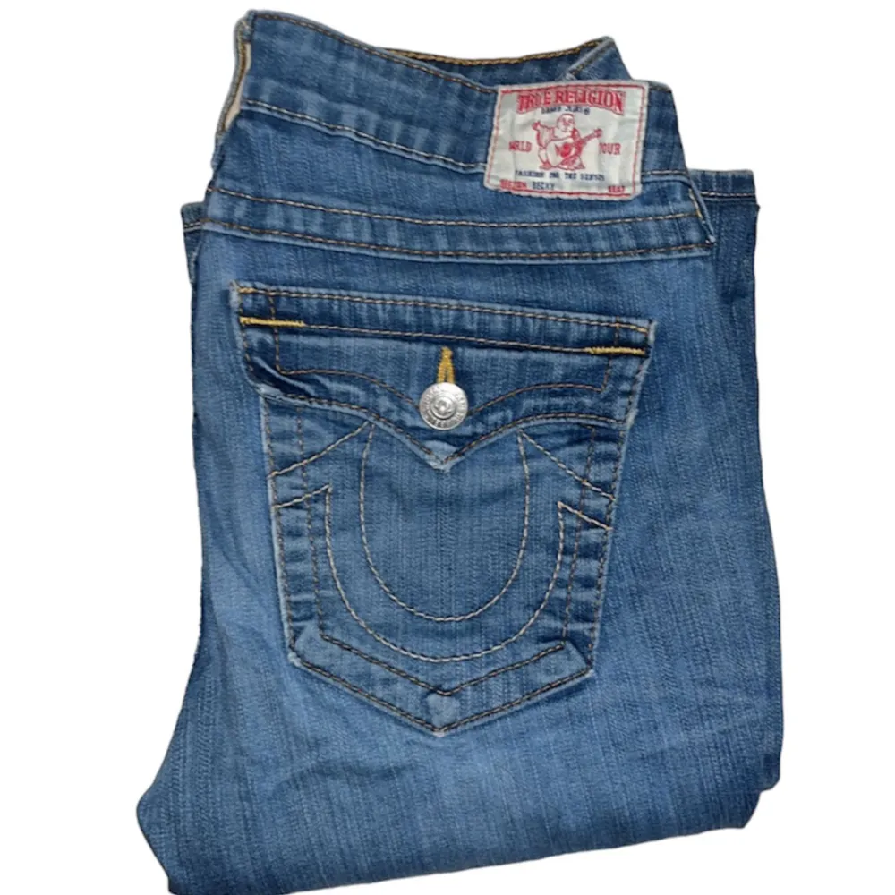 True Religion jeans Bootcut fit. W30 [Ytterbenslängd 98cm] [Innerbenslängd 73cm] [Midja 39cm] [Benöppning 22cm]. Jeans & Byxor.
