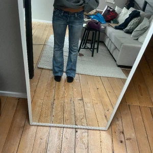 Replay jeans - Jättesnygga replayjeans med orange fickor!