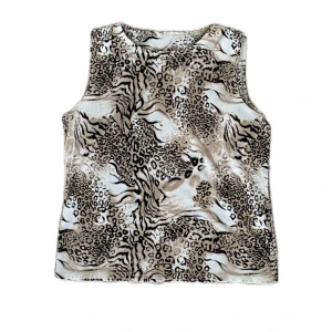 Leopardmönstrat Linne - Leopardmönstrat Linne i storlek S men passar även M - Stretchigt material! Mycket bra skick! 