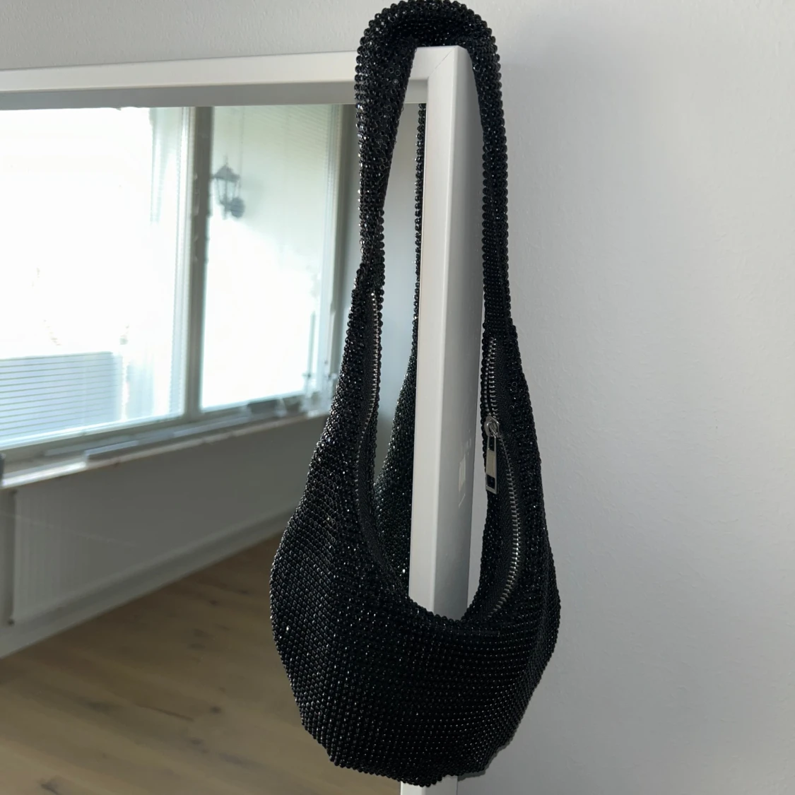 Svart glittrig väska 