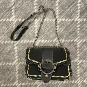 Axelremsväska  - Axelremsväska